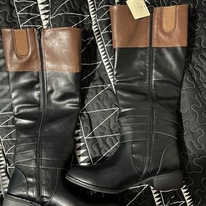 Never worn in box tall women’s boots